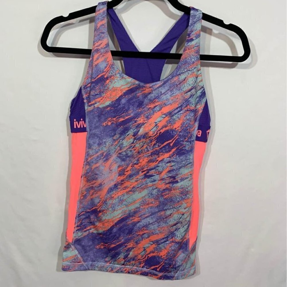 Lululemon- girls Ivivva workout top. Built in bra. Size 14. New condition. Racer